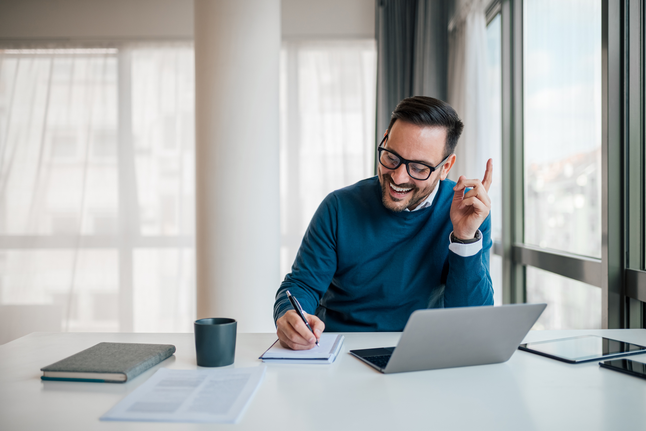 Business owner taking part in an online mentoring conversation